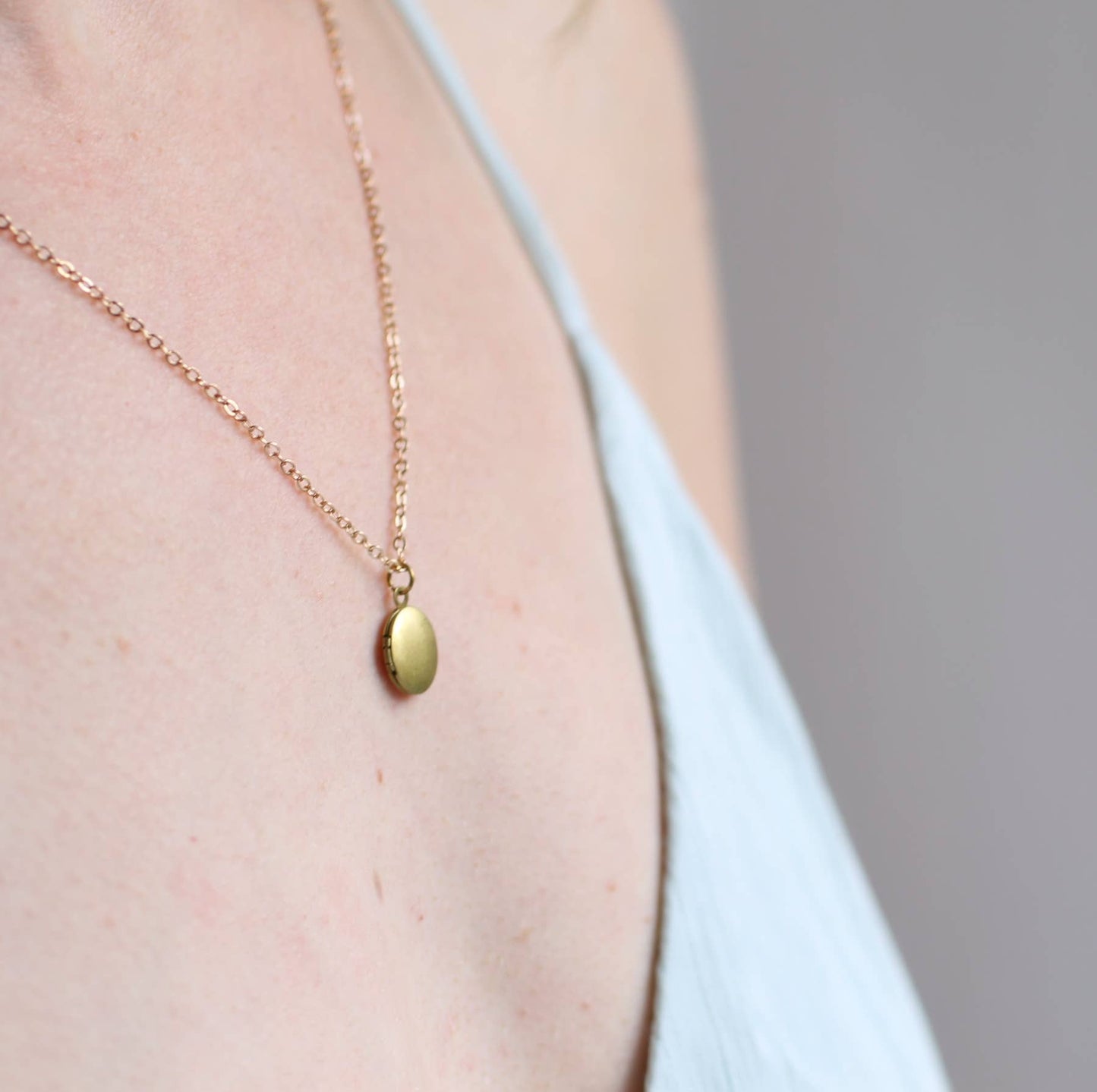 Tiny Oval Moon Engraved Botanical Brass Locket